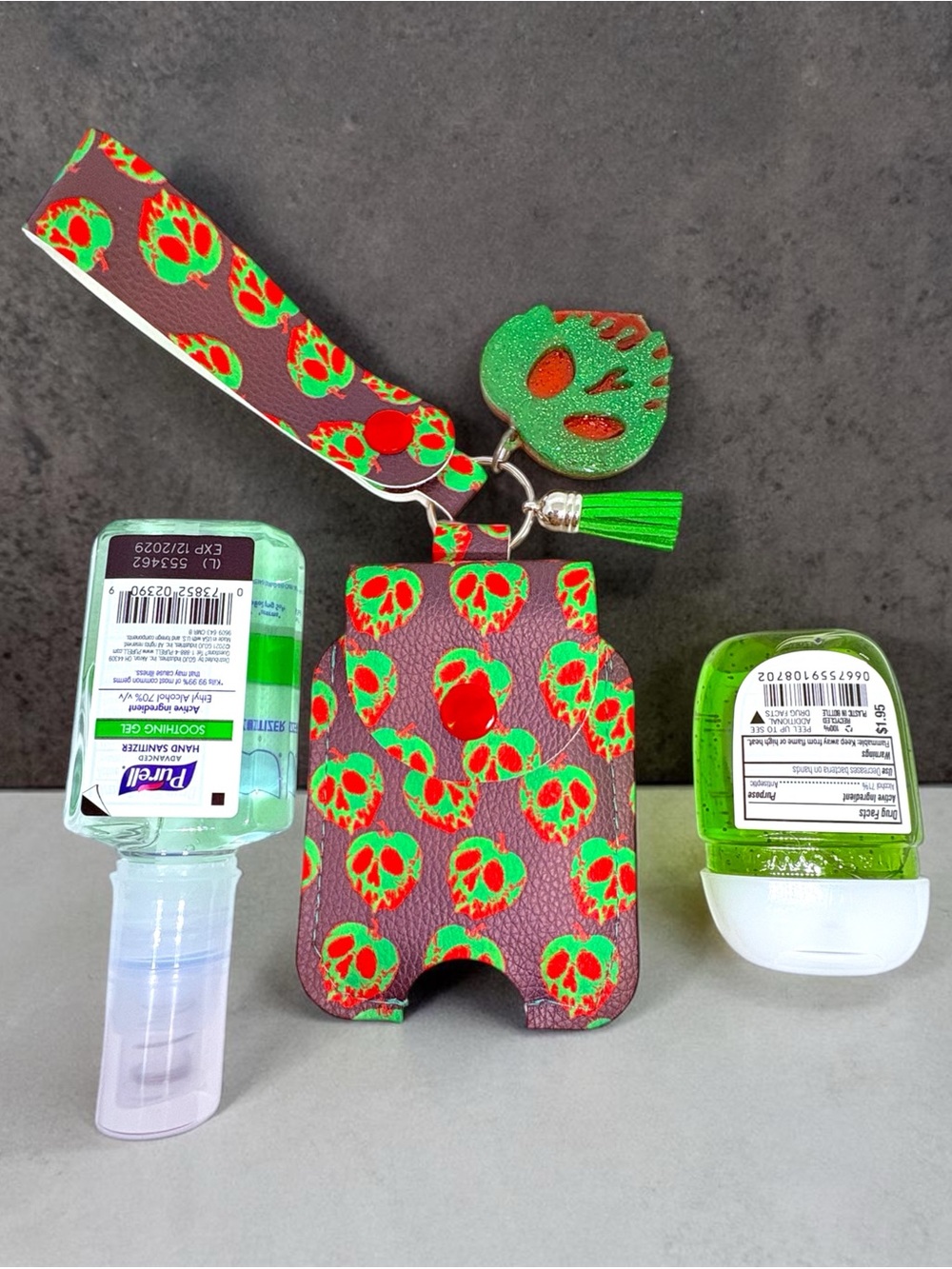 Decorative Skull Hand Sanitizer Holster with Wrist Strap - Green & Red